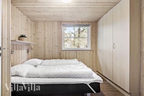 Eines der 9 Schlafzimmer im Luxusferienhaus Nr. 197