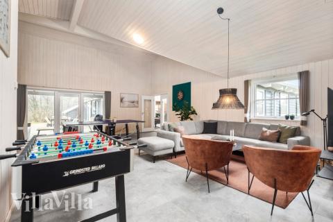 Neben den vielen schönen Stunden, die man im Poolbereich des Hauses verbringen kann, bietet das Luxusferienhaus 167 auch Spielevergnügen bei Billard/Tischtennis und Darts