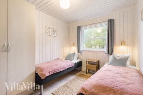 Eines der 9 Schlafzimmer im Luxusferienhaus Nr. 167