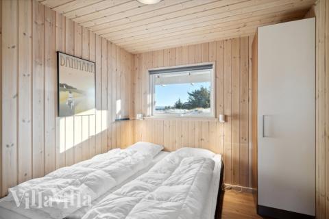 Eines der 9 Schlafzimmer im Luxusferienhaus Nr. 176