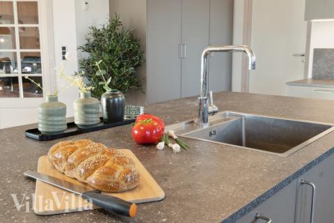 Die Küche im Luxusferienhaus Nr. 176 ist gut eingerichtet.