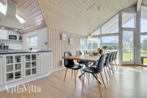 Der Aufenthaltsraum bietet Platz für 10 Personen, wenn ihr das Ferienhaus 232 in Lolland/Falster/Mön besucht.