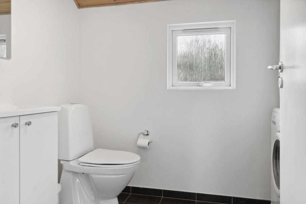 Eines der Badezimmer im Luxusferienhaus Nr. 212