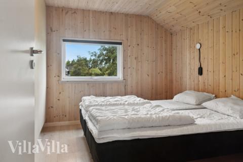 Eines der 5 Schlafzimmer im Luxusferienhaus Nr. 212