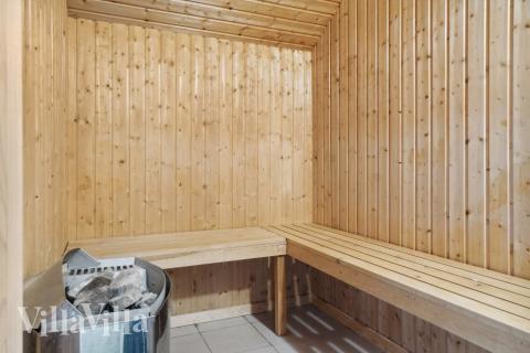 Genießen Sie die heiße Sauna im Luxusferienhaus Nr. 212 für 14 Personen