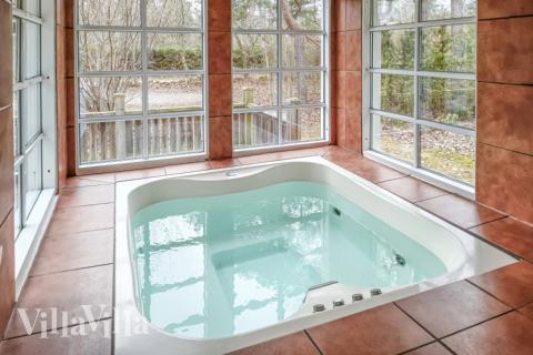 Genießen Sie den warmen Whirlpool im Luxusferienhaus Nr. 126 in Schweden