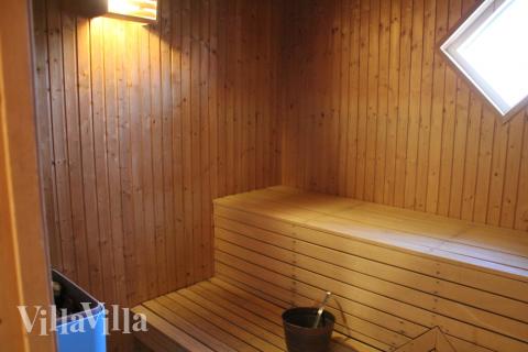 Genießen Sie die heiße Sauna im Luxusferienhaus Nr. 78 für 14 Personen