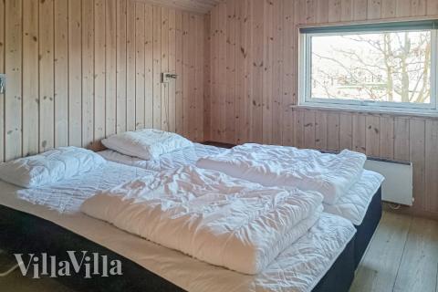 Eines der 5 Schlafzimmer im Luxusferienhaus Nr. 244