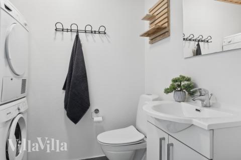 Eines der Badezimmer im Luxusferienhaus Nr. 261