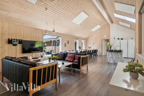 Aufenthaltsraum mit Platz für 24 im Luxusferienhaus Nr. 261.