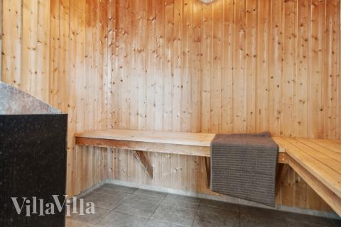 Genießen Sie die heiße Sauna im Luxusferienhaus Nr. 261 für 24 Personen