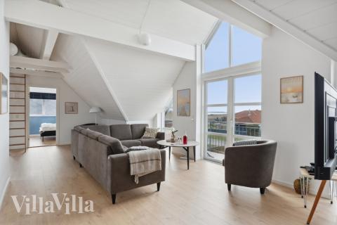 Die Couchecke im Luxusferienhaus Nr. 148 in Ostjütland.