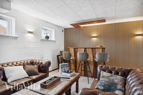 Aktivitätsraum im Luxusferienhaus Nr. 148 mit 10 Schlafzimmern und Platz für 24 Gäste.