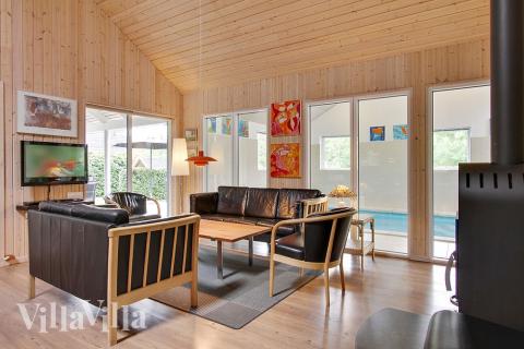 Aufenthaltsraum mit Platz für 16 im Luxusferienhaus Nr. 171.