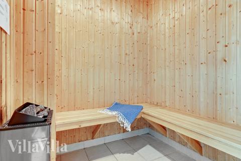 Genießen Sie die heiße Sauna im Luxusferienhaus Nr. 247 für 20 Personen