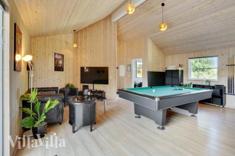 Neben den vielen schönen Stunden, die man im Poolbereich des Hauses verbringen kann, bietet das Luxusferienhaus 277 auch Spielevergnügen bei Billard/Tischtennis und Darts