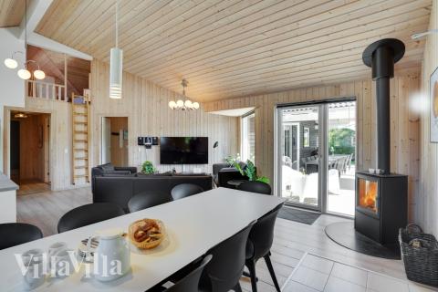 Aufenthaltsraum mit Platz für 16 im Luxusferienhaus Nr. 277.