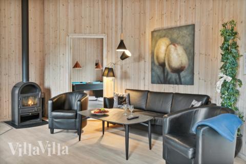 Die Couch im Luxusferienhaus Nr. 202 in Lolland/Falster/Mön lädt zu Gesellschaftsspielen oder zu Kinoabenden ein.