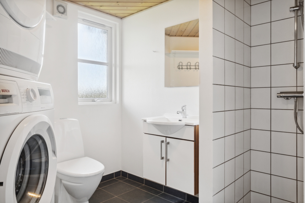 Eines der Badezimmer im Luxusferienhaus Nr. 202
