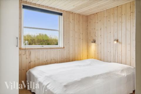 Eines der 9 Schlafzimmer im Luxusferienhaus Nr. 202