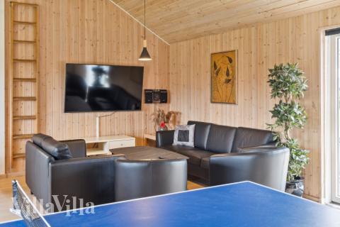 Aktivitätsraum im Luxusferienhaus Nr. 202 mit 9 Schlafzimmern und Platz für 24 Gäste.