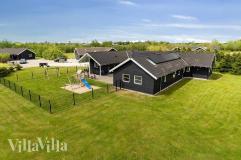 Dieses schöne Poolhaus Nr. 202 mit Platz für 24 Personen liegt in Lolland/Falster/Mön