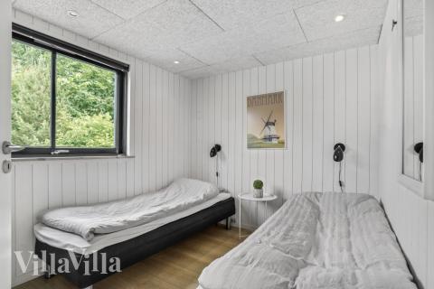 Eines der 7 Schlafzimmer im Luxusferienhaus Nr. 276