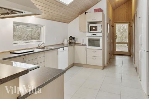 Da die Stube offen mit der Küche verbunden ist, können sich alle unterhalten und zusammen sein, während gekocht wird