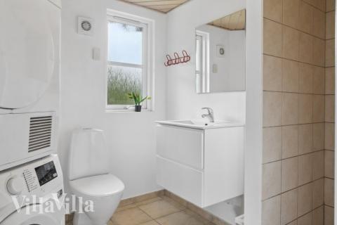 Eines der Badezimmer im Luxusferienhaus Nr. 208