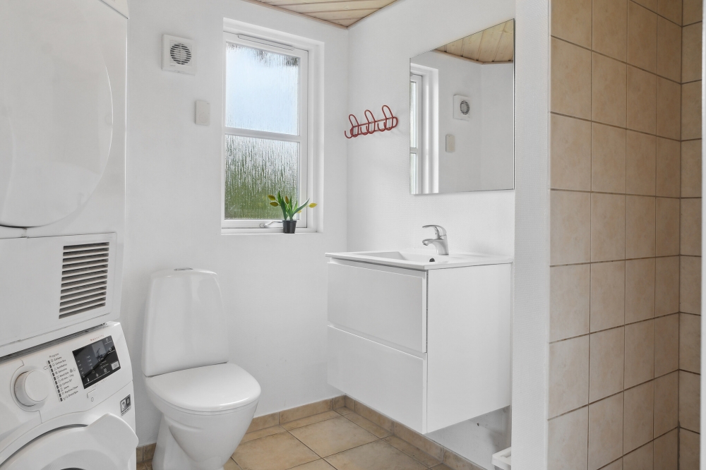 Eines der Badezimmer im Luxusferienhaus Nr. 208