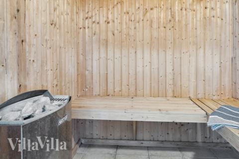 Genießen Sie die heiße Sauna im Luxusferienhaus Nr. 208 für 24 Personen