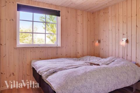 Eines der 7 Schlafzimmer im Luxusferienhaus Nr. 253