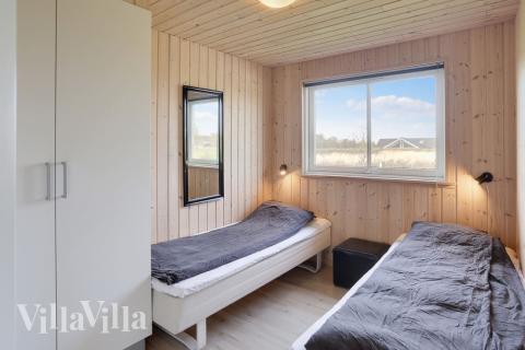 Eines der 7 Schlafzimmer im Luxusferienhaus Nr. 272