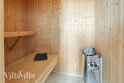Genießen Sie die heiße Sauna im Luxusferienhaus Nr. 272 für 18 Personen
