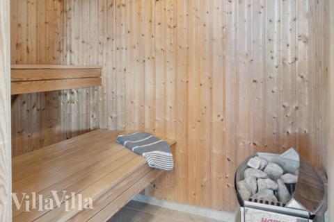 Genießen Sie die heiße Sauna im Luxusferienhaus Nr. 282 für 19 Personen
