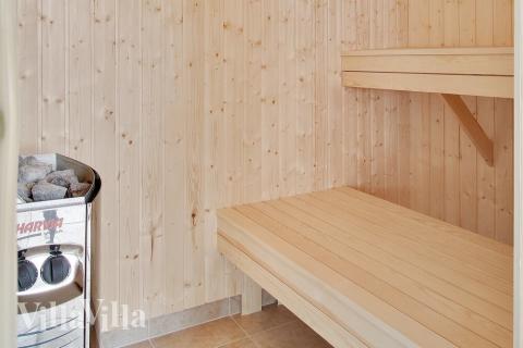 Genießen Sie die heiße Sauna im Luxusferienhaus Nr. 285 für 18 Personen