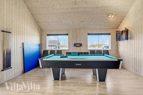 Neben den vielen schönen Stunden, die man im Poolbereich des Hauses verbringen kann, bietet das Luxusferienhaus 299 auch Spielevergnügen bei Billard/Tischtennis und Darts