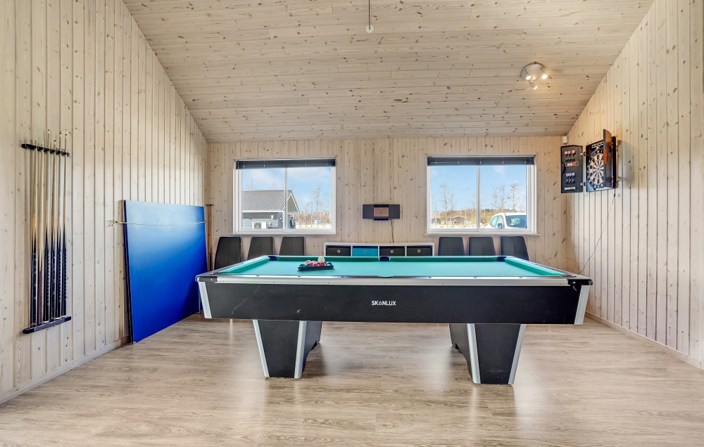 Neben den vielen schönen Stunden, die man im Poolbereich des Hauses verbringen kann, bietet das Luxusferienhaus 299 auch Spielevergnügen bei Billard/Tischtennis und Darts
