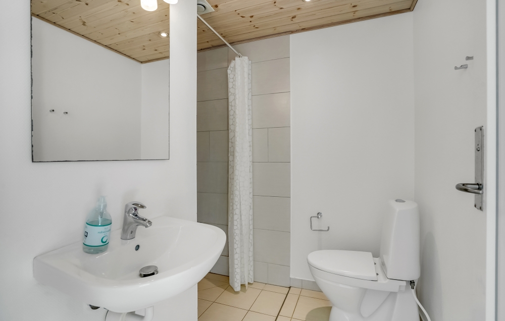 Eines der Badezimmer im Luxusferienhaus Nr. 299