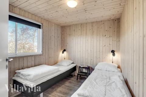 Eines der 6 Schlafzimmer im Luxusferienhaus Nr. 299