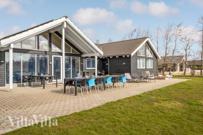 Dieses schöne Poolhaus Nr. 299 mit Platz für 16 Personen liegt in Lolland/Falster/Mön