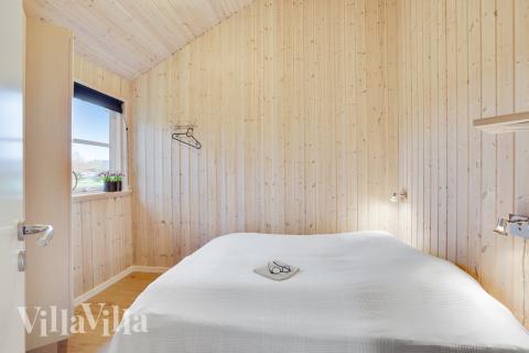 Eines der 9 Schlafzimmer im Luxusferienhaus Nr. 206