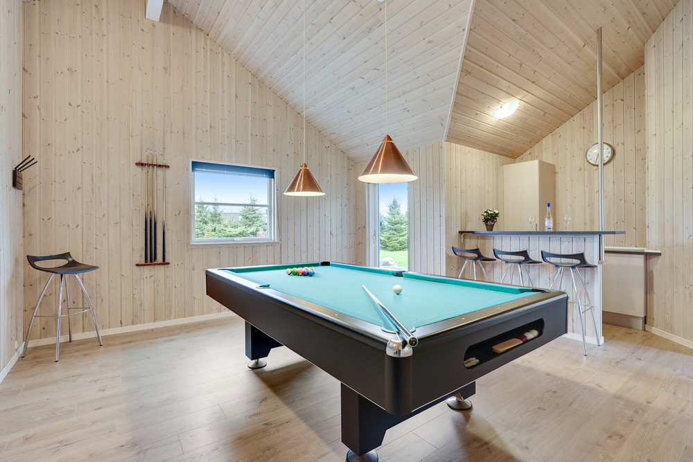 Das Luxusferienhaus 206 für 24 Personen hat einen großen Aktivitätsraum mit u. a. Billard und Darts