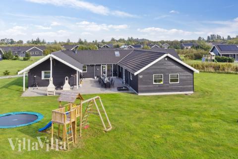 Dieses schöne Poolhaus Nr. 206 mit Platz für 24 Personen liegt in Lolland/Falster/Mön