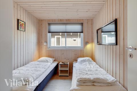 Eines der 7 Schlafzimmer im Luxusferienhaus Nr. 273