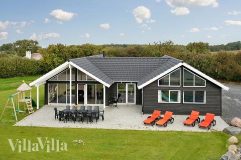 Willkommen in diesem Luxusferienhaus mit Pool in der Nähe des kinderfreundlichen Strandes bei Skastrup auf der nordlichen Seite der Insel Fünen 