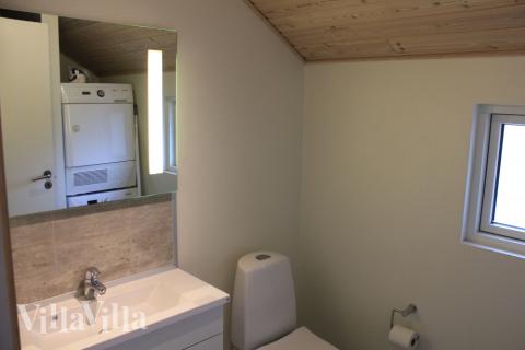 Eines der Badezimmer im Luxusferienhaus Nr. 303