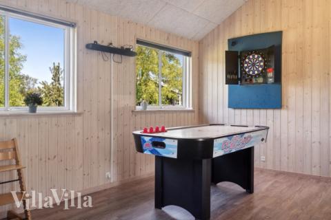 Das Luxusferienhaus 314 für 20 Personen hat einen großen Aktivitätsraum mit u. a. Billard und Darts