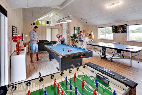 In dem Aktivitetsraum können Sie Billiard, Kicker, Darts oder Tischtennis spielen.