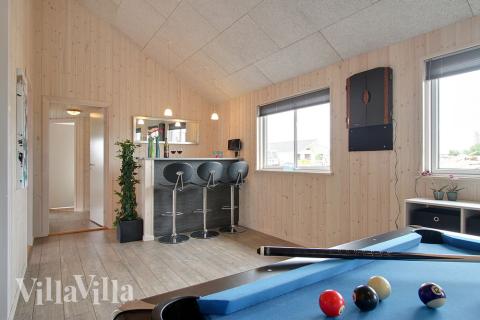 Aktivitätsraum im Luxusferienhaus Nr. 322 mit 7 Schlafzimmern und Platz für 18 Gäste.